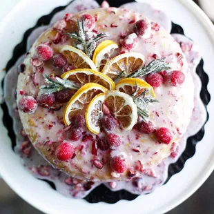 a cake with lemons and cranberries