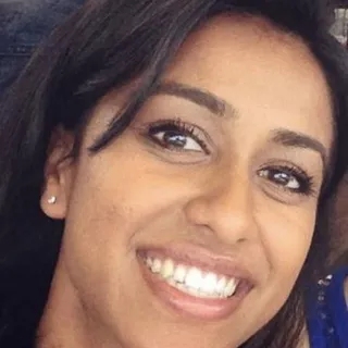 Nidhi M.