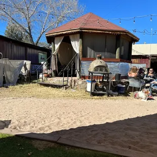A fun little bungalow and outdoor pizza oven.