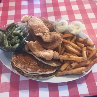 All you can eat catfish, cajun fries, green beans, and hoe cakes!!