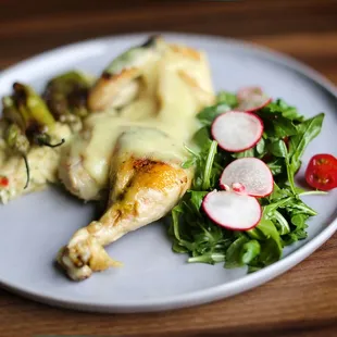 a plate of food on a wooden table