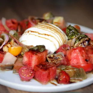 a plate of food with a scoop of ice cream