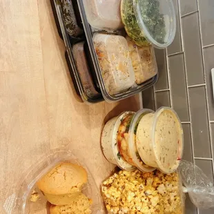 a variety of food in plastic containers