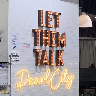 let them talk pearl city neon sign