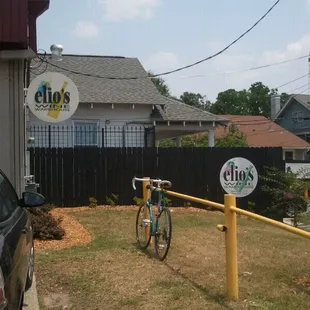 a bicycle parked in front of the store