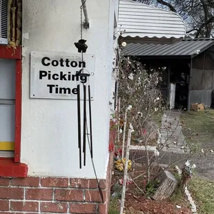 a yellow bucket outside of a store