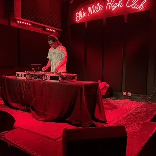 Inside DJ spinning vinyls