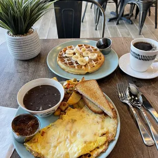 Turkey omelette with a side of vanilla waffles with banana and black coffee to wash it all down