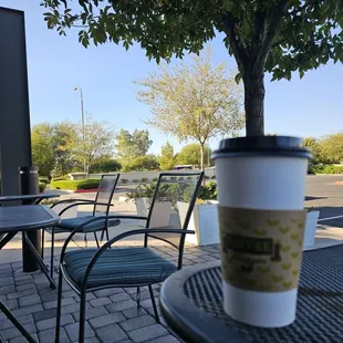 a cup of coffee on a table