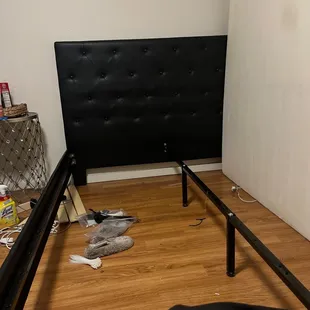 if you look close you see the flimsy wooden slats in the back and the zip ties I bought to try to hold them in place