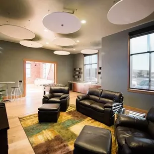 The Game Room is set up like a living room with TV's and wet-bar.