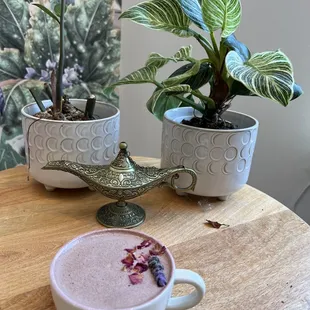 8.3.23 My magical signature lavender rose cacao latte with vitality oil drops... love the Aladdin lamp decor