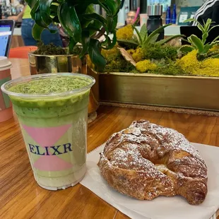 iced strawberry matcha oatmilk latte, almond croissant