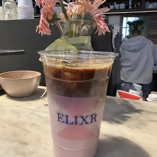 Pre-mixed iced strawberry oat milk latte