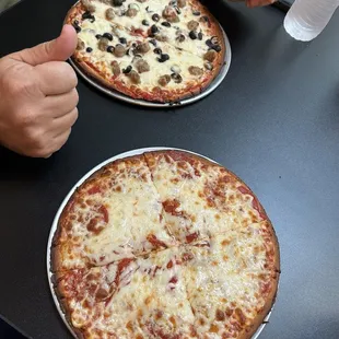 10&quot; gluten Keto &amp; Gluten-Free Personal Pizza- one with sausage and olives and another with barely pepperoni on it.