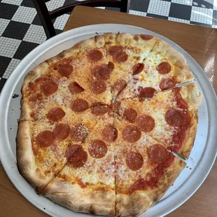 Whole freshly made pepperoni pie.