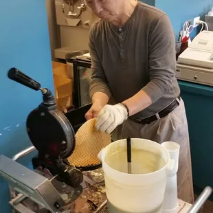 Step 2 of waffle cone creation.