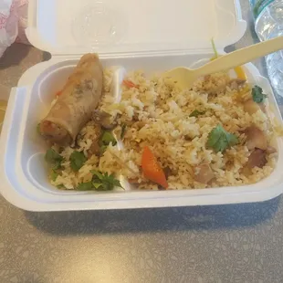 Chicken and bacon (not sure if they added the bacon) fried rice with a shrimp egg roll