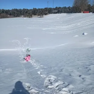 Sledding into the soccer field