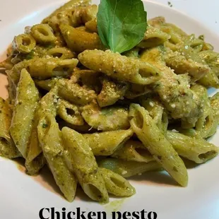 Penne with chicken in pesto sauce.
