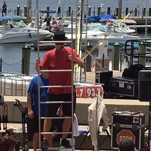 Street entertainment along the trail by the marina behind the Waterfront District building