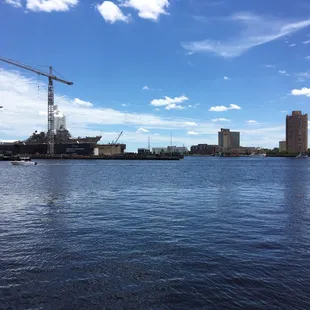 A ship being built across the river