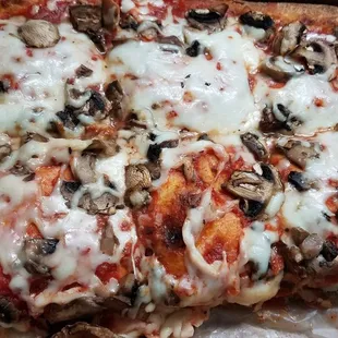 Half of our Mushroom Sicilian pizza