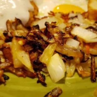 Beautiful hash browns with grilled onions