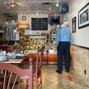 a man standing in a restaurant