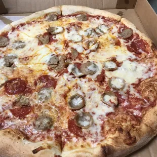 Pepperoni and sausage. Sausage was round like pepperonis.
