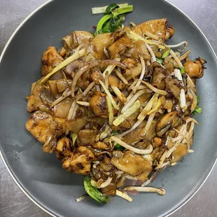 a plate of stir fried vegetables