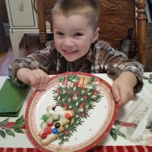 Making a cookie in the kitchen.