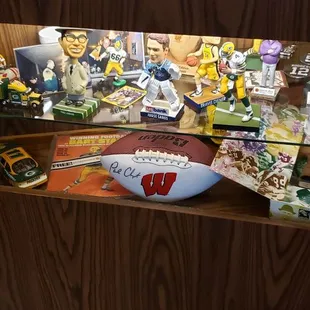 a football and other sports memorabilia