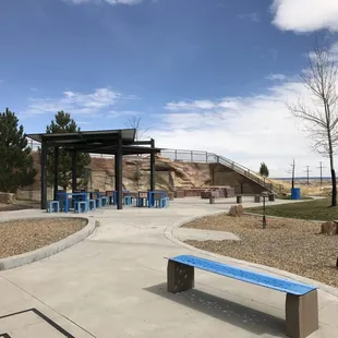 view to the right of playground at maze entrance. The far patio area is the splash pad fountain