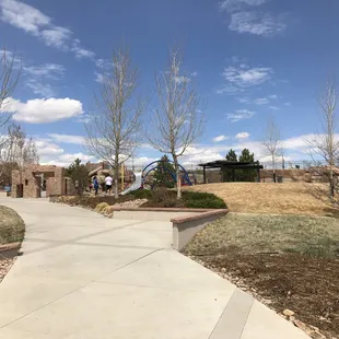 walking up to play area from parking lot