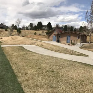 I think this building has bathrooms but it seems to always be locked. There's a port-a-potty at one of the parking lots.