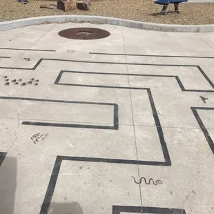 walking maze at entrance to play area