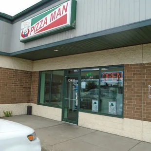 Outside of the shop, view looking southeast.