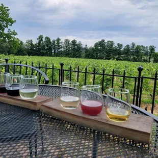 three glasses of wine on a table