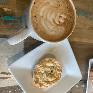a cup of coffee and a biscuit