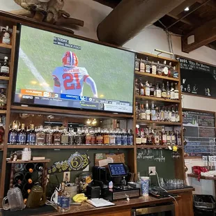 The big tv at the bar and more whiskey.