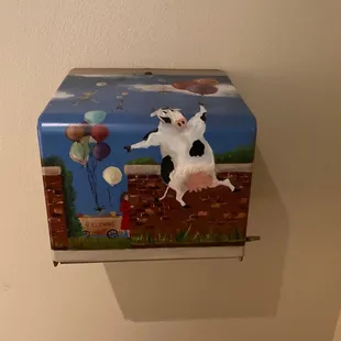 a cow on a wall