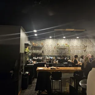 people sitting at a bar