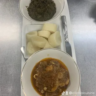 a bowl of stew and a plate of potatoes