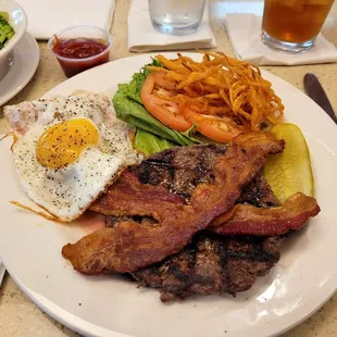 Sunshine Burger -  1/2 pound brisket-short rib blend, bacon, lettuce, tomato, fried onion, sunny side egg, chipotle ranch with no bun