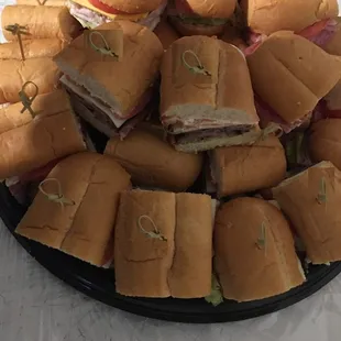 a platter of sandwiches