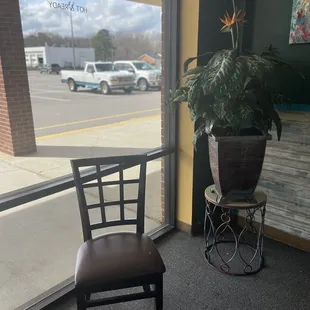 Lone seat to wait for your takeout order
