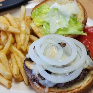 Mushroom &amp; Swiss burger with onions. Crispy fries.