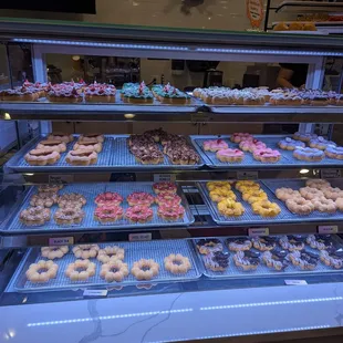 a display case of donuts