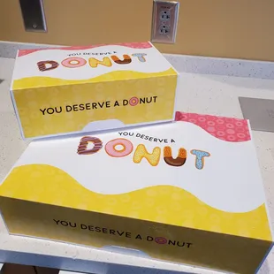 two boxes of donuts